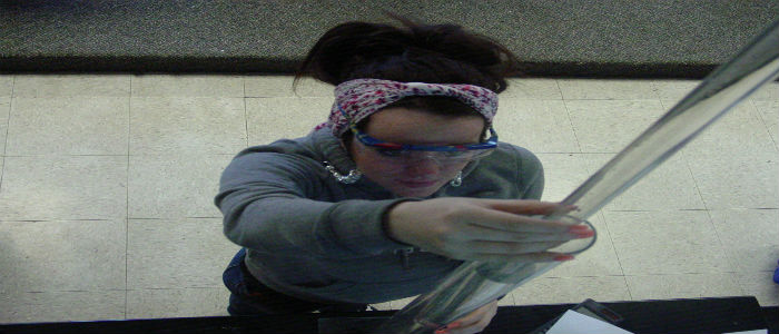 Victoria Jarrett makes an accurate measurement of a volume change.